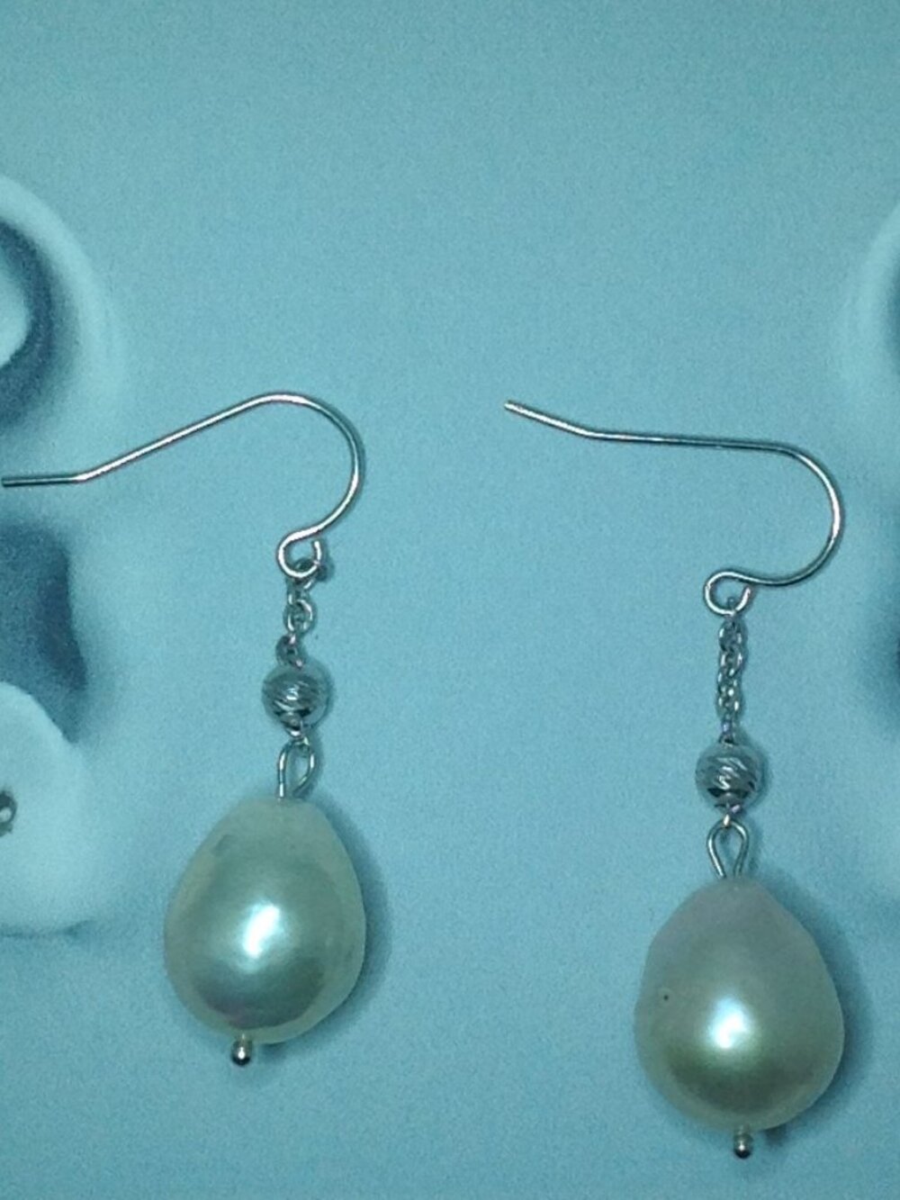 Silver Dangling Nucleated Freshwater Pearl Earrings.